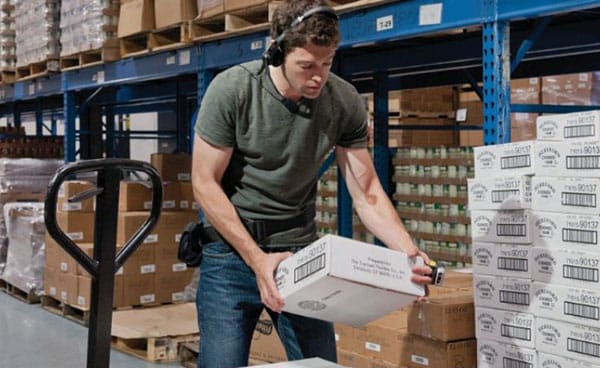 warehouse worker using zebra devices warehouse worker using zebra devices