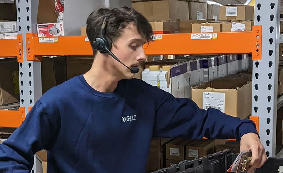 warehouse worker wearing headset