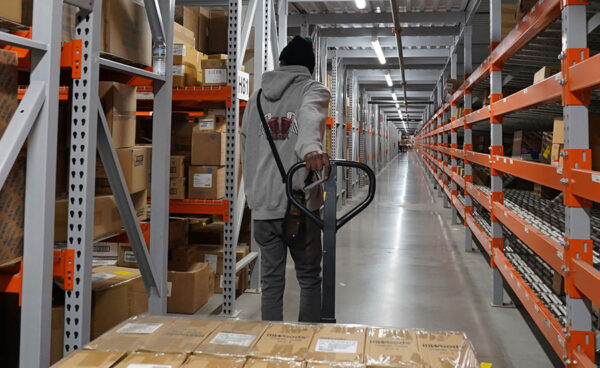 Orgill worker pulling a pallet